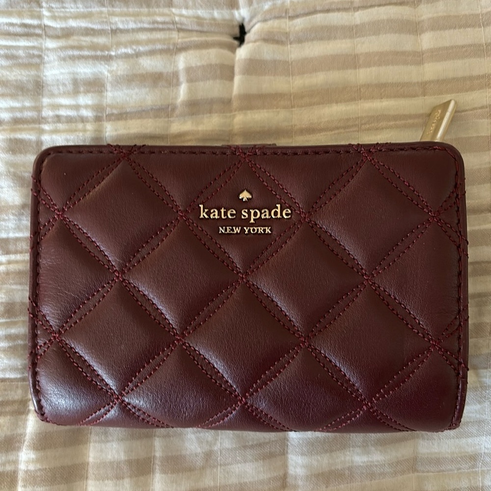 Burgundy quilted Kate Spade snap wallet